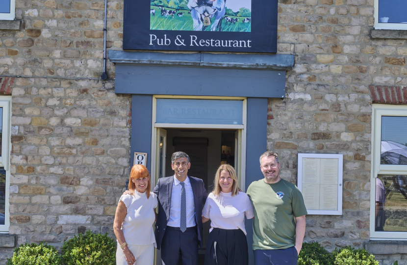 Rishi Sunak with the Billau family