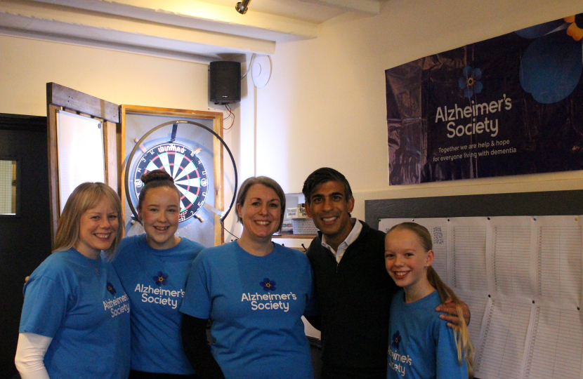 Rishi with Natalie, Staff and Volunteers at the event