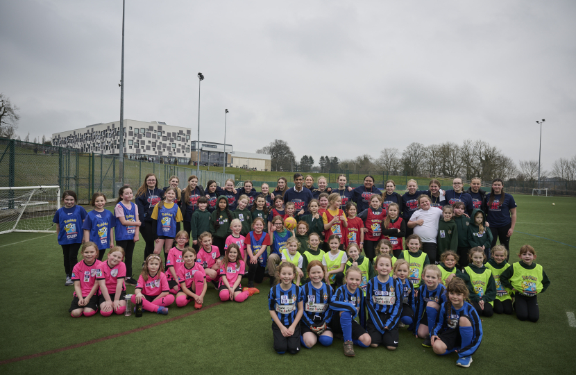 Rishi Sunak with football tournament players