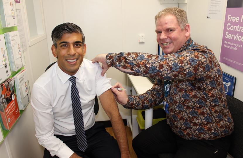 Rishi Sunak receives his flu vaccination at Well Pharmacy, Northalleton