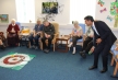Rishi Sunak plays a game with attendees at the Bluebell House day centre