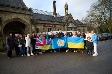 Rishi with Mr Farrow and Mr White alongside members of the Ukrainian community