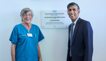 Rishi Sunak MP alongside long-serving theatre nurse Anne