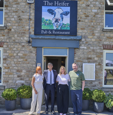 Rishi Sunak with the Billau family